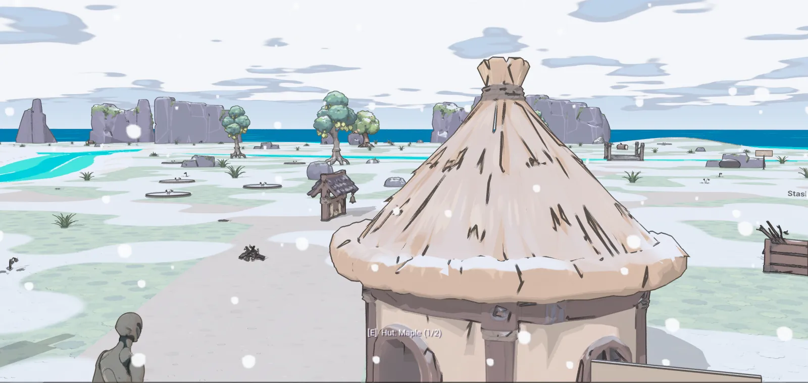 A thatched hut on Broadmeadow in winter, snow on the roof and the ground, snow falling